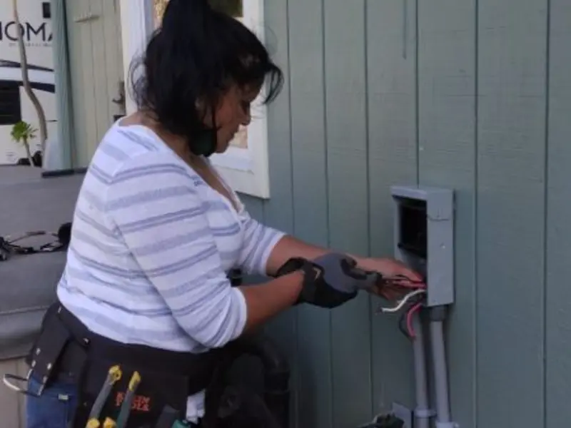 Licensed electrician wiring an exterior subpanel in Franklin Park